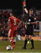 24 March 2017; Neil Taylor of Wales is sent off by referee Nicola Rizzoli following his tackle on Seamus Coleman of Republic of Ireland during the FIFA World Cup Qualifier Group D match between Republic of Ireland and Wales at the Aviva Stadium in Dublin. Photo by David Maher/Sportsfile