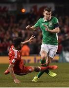 24 March 2017; (EDITORS NOTE: Image contains graphic content.) Seamus Coleman of Republic of Ireland is tackled by Neil Taylor of Wales during the FIFA World Cup Qualifier Group D match between Republic of Ireland and Wales at the Aviva Stadium in Dublin. Photo by David Maher/Sportsfile