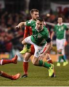 24 March 2017; (EDITORS NOTE: Image contains graphic content.) Seamus Coleman of Republic of Ireland is tackled by Neil Taylor of Wales during the FIFA World Cup Qualifier Group D match between Republic of Ireland and Wales at the Aviva Stadium in Dublin. Photo by David Maher/Sportsfile Photo by David Maher/Sportsfile