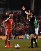 24 March 2017; Neil Taylor of Wales is sent off by referee Nicola Rizzoli following his tackle on Seamus Coleman of Republic of Ireland during the FIFA World Cup Qualifier Group D match between Republic of Ireland and Wales at the Aviva Stadium in Dublin. Photo by David Maher/Sportsfile