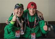 25 March 2017; Team Ireland's Brian McDonnell, a member of Mallow United Special Olympics Club, from Cork City, Co. Cork, and James Healy, a member COPE Foundation Cork Special Olympics Club, from Ovens, Co. Cork at Vienna Airport as Team Ireland return from the 2017 Special Olympics World Winter Games in Graz, Austria, at Dublin Airport in Dublin. Photo by Ray McManus/Sportsfile