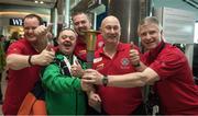 25 March 2017; Team Ireland's Cyril Walker, a member of Skiability Special Olympics Club, from Markethill, Co. Armagh, with PSNI members of the Law Enforcement Torch Run for Special Olympics team, left to right, Diarmuid Sands, Ivan Shields, Jeremy Adams and David McCausland as Team Ireland athletes and supporters returned from the 2017 Special Olympics World Winter Games in Graz, Austria, at Dublin Airport in Dublin. Photo by Ray McManus/Sportsfile