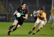 25 March 2017; Rory Grugan of Armagh in action against Conor Hamill of Antrim  during the Allianz Football League Division 3 Round 6 game between Armagh and Antrim at Athletic Grounds in Armagh. Photo by Oliver McVeigh/Sportsfile