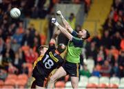 25 March 2017; Ciaran McKeever of Armagh in action against Chris Kerr of Antrim  during the Allianz Football League Division 3 Round 6 game between Armagh and Antrim at Athletic Grounds in Armagh. Photo by Oliver McVeigh/Sportsfile