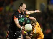 25 March 2017; Ciaran McKeever of Armagh in action against Peter Healy of Antrim  during the Allianz Football League Division 3 Round 6 game between Armagh and Antrim at Athletic Grounds in Armagh. Photo by Oliver McVeigh/Sportsfile