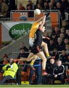 25 March 2017; Niall Grimley of Armagh in action against Conor Murray of Antrim  during the Allianz Football League Division 3 Round 6 game between Armagh and Antrim at Athletic Grounds in Armagh. Photo by Oliver McVeigh/Sportsfile