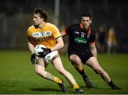 25 March 2017; Stephen Beatty of Antrim  in action against Gavin McParland of Armagh during the Allianz Football League Division 3 Round 6 game between Armagh and Antrim at Athletic Grounds in Armagh. Photo by Oliver McVeigh/Sportsfile