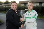 3 September 2011; John Mullins, CEO, Bord Gáis, presents the Cup trophy to Blackrock, Limerick, captain Richie Murphy. St. Jude's All-Ireland Junior Hurling 7s Tournament sponsored by Bord Gáis Energy. 20 club teams from around the country competed for the hurling title, while the football competition takes place on Saturday September 18th. St. Jude's GAA Club, Wellington Lane, Templeogue, Dublin. Picture credit: Pat Murphy / SPORTSFILE