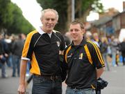 4 September 2011; Kilkenny supporters Bill Brennan, left, from Freshford, and Dermot Hogan, from Kilmanagh, on their way to the game. Supporters at the GAA Hurling All-Ireland Championship Finals, Croke Park, Dublin. Picture credit: Dáire Brennan / SPORTSFILE