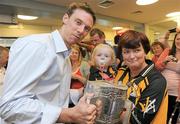 5 September 2011; Kilkenny captain Brian Hogan with Holly Gorey, age 2, and her grandaunt Bridget Lannon, from Kilkenny, during the team's visit to Our Lady's Hospital for Sick Children, Crumlin, Dublin. Photo by Sportsfile