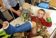 5 September 2011; Four year old Daniel Johns, from Clonard, Co. Meath, with the Liam MacCarthy cup, during the visit of the Kilkenny hurling team to Our Lady's Hospital for Sick Children, Crumlin, Dublin. Photo by Sportsfile