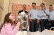 5 September 2011; Seven year old Saoirse Mullan, from Thurles, Co. Tipperary, lifts the Liam MacCarthy cup in front of Kilkenny players, from left, Tommy Walsh, captain Brain Hogan, Michael Fennelly and Jackie Tyrrell during the visit of the Kilkenny hurling team to Our Lady's Hospital for Sick Children, Crumlin, Dublin. Photo by Sportsfile