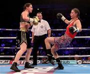 25 March 2017; Katie Taylor, left, trades punches with Milena Koleva during their Manchester Fight Night super featherweight bout at Manchester Arena in Manchester, England. Photo by Lawrence Lustig/Sportsfile