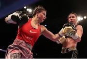 25 March 2017; Katie Taylor, right, trades punches with Milena Koleva during their Manchester Fight Night super featherweight bout at Manchester Arena in Manchester, England. Photo by Lawrence Lustig/Sportsfile