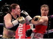 25 March 2017; Katie Taylor, left, trades punches with Milena Koleva during their Manchester Fight Night super featherweight bout at Manchester Arena in Manchester, England. Photo by Lawrence Lustig/Sportsfile