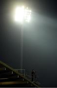 25 March 2017; A single cameraman recording the match from the roof of the stand under the floodlights during the Allianz Football League Division 3 Round 6 game between Armagh and Antrim at Athletic Grounds in Armagh. Photo by Oliver McVeigh/Sportsfile
