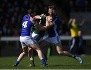 26 March 2017; Fergal Reilly, left, and Killian Clarke of Cavan tussle with Paul Geaney of Kerry during the Allianz Football League Division 1 Round 6 match between Cavan and Kerry at Kingspan Breffni Park in Cavan. Photo by Stephen McCarthy/Sportsfile