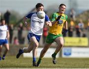 26 March 2017; Karl O'Connell of Monaghan in action against Ciaran Thompson of Donegal during the Allianz Football League Division 1 Round 6 match between Donegal and Monaghan at Fr. Tierney Park in Ballyshannon, Co. Donegal. Photo by Philip Fitzpatrick/Sportsfile