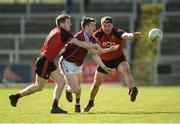 26 March 2017; Johnny Heaney of Galway in action against Conor Maginn, left, and Peter Turley of Down during the Allianz Football League Division 2 Round 6 match between Down and Galway at Páirc Esler in Newry. Photo by David Fitzgerald/Sportsfile