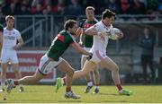 26 March 2017; Matthew Donnelly of Tyrone in action against Tom Parsons of Mayo during the Allianz Football League Division 1 Round 6 match between Tyrone and Mayo at Healy Park in Omagh. Photo by Oliver McVeigh/Sportsfile