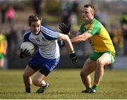 26 March 2017; Jack McCarron of Monaghan in action against Neil McGee of Donegal during the Allianz Football League Division 1 Round 6 match between Donegal and Monaghan at Fr. Tierney Park in Ballyshannon, Co. Donegal. Photo by Philip Fitzpatrick/Sportsfile