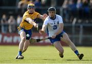 26 March 2017; Kevin Moran of Waterford in action against Seadna Morey of Clare during the Allianz Hurling League Division 1A Round 5 match between Clare and Waterford at Cusack Park in Ennis. Photo by Diarmuid Greene/Sportsfile