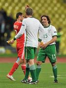 6 September 2011; Richard Dunne, Republic of Ireland, wearing a replacement jersey with his number written on it, is congratulated by Stephen Hunt at the end of the game. EURO 2012 Championship Qualifier, Russia v Republic of Ireland, Luzhniki Stadium, Moscow, Russia. Picture credit: David Maher / SPORTSFILE