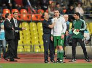 6 September 2011; Richard Dunne, Republic of Ireland, is attended to by team physio Ciaran Murray during the game. EURO 2012 Championship Qualifier, Russia v Republic of Ireland, Luzhniki Stadium, Moscow, Russia. Picture credit: David Maher / SPORTSFILE