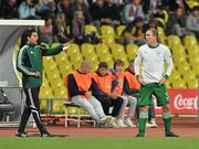 6 September 2011; Richard Dunne, Republic of Ireland, with the fourth official Babak Rafati, before being allowed back onto the pitch with a replacement jersey. EURO 2012 Championship Qualifier, Russia v Republic of Ireland, Luzhniki Stadium, Moscow, Russia. Picture credit: David Maher / SPORTSFILE