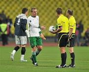 6 September 2011; Richard Dunne, Republic of Ireland, with referee Felix Brych at the end of the game. EURO 2012 Championship Qualifier, Russia v Republic of Ireland, Luzhniki Stadium, Moscow, Russia. Picture credit: David Maher / SPORTSFILE