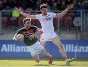 26 March 2017; David Drake of Mayo in action against Matthew Donnelly of Tyrone  during the Allianz Football League Division 1 Round 6 match between Tyrone and Mayo at Healy Park in Omagh. Photo by Oliver McVeigh/Sportsfile