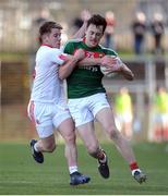 26 March 2017; Diarmuid O'Connor of Mayo  in action against Mark Bradley of Tyrone  during the Allianz Football League Division 1 Round 6 match between Tyrone and Mayo at Healy Park in Omagh. Photo by Oliver McVeigh/Sportsfile