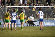 26 March 2017; Conor McManus of Monaghan puts the ball passed Mark Anthony McGinley during the Allianz Football League Division 1 Round 6 match between Donegal and Monaghan at Fr. Tierney Park in Ballyshannon, Co. Donegal. Photo by Philip Fitzpatrick/Sportsfile