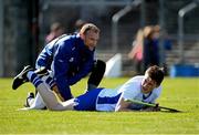 26 March 2017; Austin Gleeson of Waterford receives treatment from physio Conor McCarthy before the Allianz Hurling League Division 1A Round 5 match between Clare and Waterford at Cusack Park in Ennis. Photo by Diarmuid Greene/Sportsfile