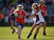 26 March 2017; Karen O’Quigley of Holy Faith, Clontarf in action against Ellen Moore of Presentation, Thurles during the Lidl All Ireland PPS Senior C Championship Final match between Presentation S.S and Holy Faith S.S at O'Moore Park in Portlaoise. Photo by Seb Daly/Sportsfile