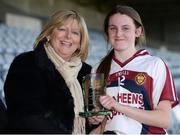 26 March 2017; Casey Hennessy of Presentation, Thurles, right, is presented with the Player of the Match award by Marie Hickey, President, LGFA, following her side's victory during the Lidl All Ireland PPS Senior C Championship Final match between Presentation S.S and Holy Faith S.S at O'Moore Park in Portlaoise. Photo by Seb Daly/Sportsfile