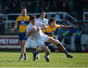 26 March 2017; Mick O'Grady of Kildare in action against Cian O'Dea of Clare during the Allianz Football League Division 2 Round 6 match between Kildare and Clare at St Conleth's Park in Newbridge. Photo by Daire Brennan/Sportsfile