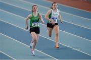 26 March 2017; Hollie McCarthy of Liscarroll AC, Co Cork,  on her way to winning her U15 Women's 60m Heat, ahead of Chloe Farragher of Craughwell AC, Co Galway, during the Irish Life Health Juvenile Indoor Championships 2017 day 2 at the AIT International Arena in Athlone, Co. Westmeath. Photo by Sam Barnes/Sportsfile