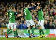 26 March 2017; Conor Washington, right, of Northern Ireland celebrates with Conor McLaughlin and Steven Davis of Northern Ireland after scoring his side's second goal during the FIFA World Cup Qualifer Group C match between Northern Ireland and Norway at Windsor Park in Belfast. Photo by Oliver McVeigh/Sportsfile