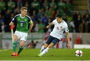 26 March 2017; Steven Davis of Northern Ireland in action against Tarik Elyounoussi of Norway during the FIFA World Cup Qualifer Group C match between Northern Ireland and Norway at Windsor Park in Belfast. Photo by Oliver McVeigh/Sportsfile