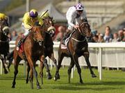 10 September 2011; Born To Sea, left, with Johnny Murtagh up, on their way to winning the Irish Field Blenheim Stakes, ahead of eventual 3rd place An Ghalanta, right, with Kevin Manning up. The Curragh Racecourse, The Curragh, Co. Kildare. Photo by Sportsfile