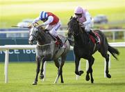 10 September 2011; Duncan, left, with Eddie Ahern up, and Jukebox, with Johnny Murtagh up, on their way to finishing in a dead heat in the Irish Field St. Leger. The Curragh Racecourse, The Curragh, Co. Kildare. Photo by Sportsfile