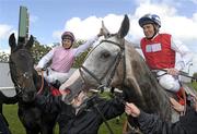 10 September 2011; Jockeys Eddie Ahern, left, on Duncan, and Johnny Murtagh, on Jukebox, celebrate after finishing in a dead heat in the Irish Field St. Leger. The Curragh Racecourse, The Curragh, Co. Kildare. Photo by Sportsfile