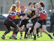 10 September 2011; Brona Kelly, centre, Kilkenny RFC, is tackled by Ethna Walsh, left, Sara Nolan, centre, and Claire Buckley, Enniscorthy RFC. Leinster Womens Rugby Season Opener Blitz, Kilkenny RFC v Enniscorthy RFC, Ashbourne RFC, Ashbourne, Co. Meath. Picture credit: Barry Cregg / SPORTSFILE