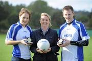 10 September 2011; Suzanne Holmes, centre, Communications Director with MBNA, presents Irene Munnelly, left, St. Ultans GAA Club, Bohermeen, Co. Meath, and Shane Duffy, Magheracloone GAA Club, Co. Monaghan, with their winners medals after claming the 2011 MBNA Ladies title and the 2011 MBNA Mens title respectively. MBNA Kick Fada Finals 2011, Bray Emmets GAA Club, Co. Wicklow. Picture credit: Matt Browne / SPORTSFILE