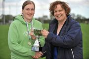 10 September 2011; Chairperson of Leinster Womens Rugby Mary Quinn, right, presents the group 2 trophy to Sara Nolan, Enniscorthy RFC. Leinster Womens Rugby Season Opener Blitz, Ashbourne RFC, Ashbourne, Co. Meath. Picture credit: Barry Cregg / SPORTSFILE