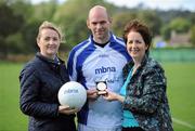 10 September 2011; Kildare GAA star Paul Flood who finished third after a sudden-death shootout. A member of Maynooth GAA Club, Co. Kildare, receives his medel from Suzanne Holmes, left, Communications Director with MBNA, and Frances Stephenson, from Bray Emmets GAA Club, Co. Wicklow, after the Mens MBNA Kick Fada Finals 2011. Bray Emmets GAA Club, Co. Wicklow. Picture credit: Matt Browne / SPORTSFILE