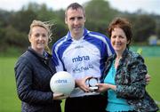10 September 2011; Armagh GAA star Paul Hearty who finished second after a sudden-death shootout. A member of Crossmaglen Rangers, Co. Armagh, receives his medel from Suzanne Holmes, left, Communications Director with MBNA, and Frances Stephenson, from Bray Emmets GAA Club, Co. Wicklow, after the Mens MBNA Kick Fada Finals 2011. Bray Emmets GAA Club, Co. Wicklow. Picture credit: Matt Browne / SPORTSFILE