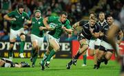 11 September 2011; Tommy Bowe, Ireland, races through the USA defence on his way to scoring his side's first try. 2011 Rugby World Cup, Pool C, Ireland v USA, Stadium Taranaki, New Plymouth, New Zealand. Picture credit: Brendan Moran / SPORTSFILE