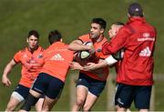 27 March 2017; Conor Murray of Munster is tackled by Ian Keatley, left, and Andrew Conway, right, during squad training at the University of Limerick in Limerick. Photo by Diarmuid Greene/Sportsfile